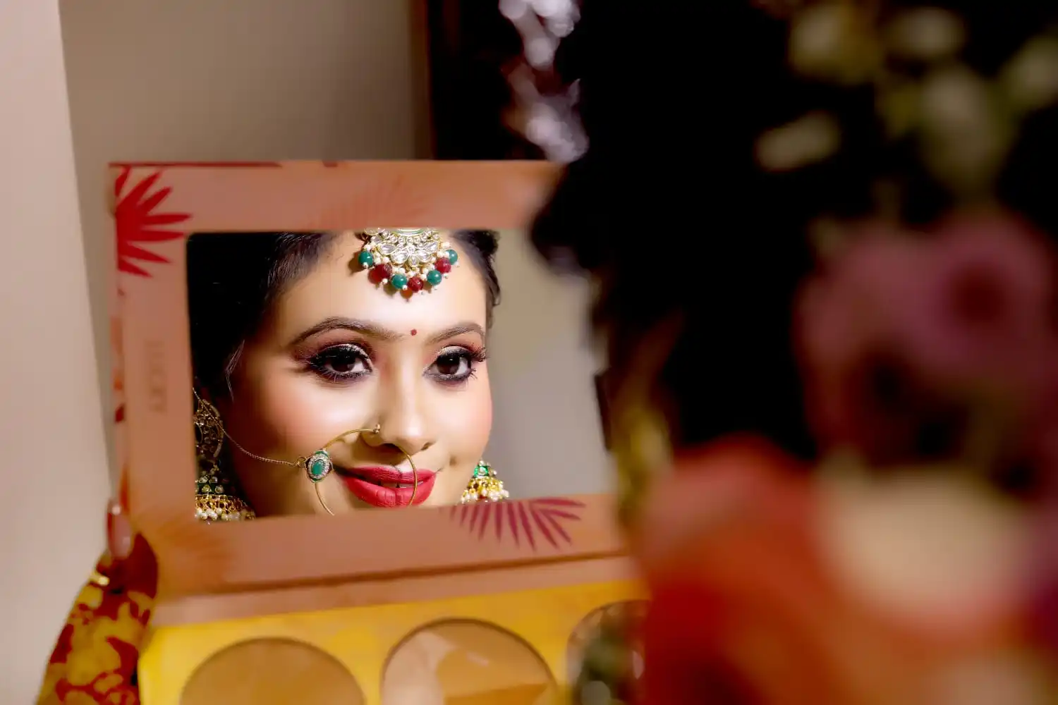 Bridal makeup reflection in mirror at Looks and Locks