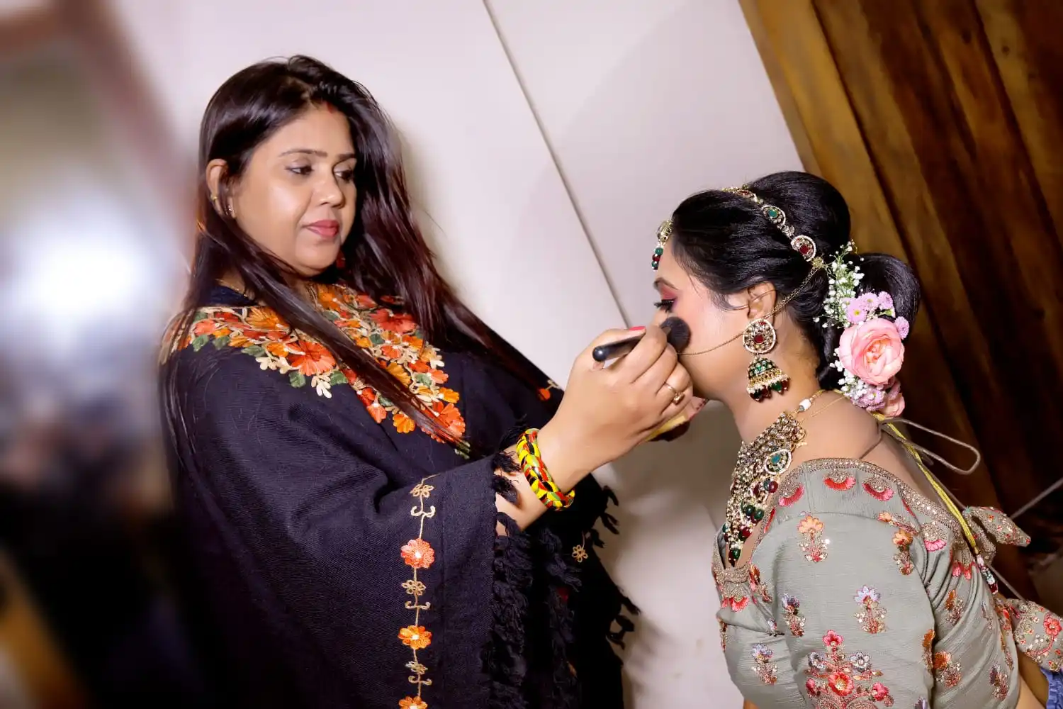 Bridal makeup session in progress at Looks and Locks