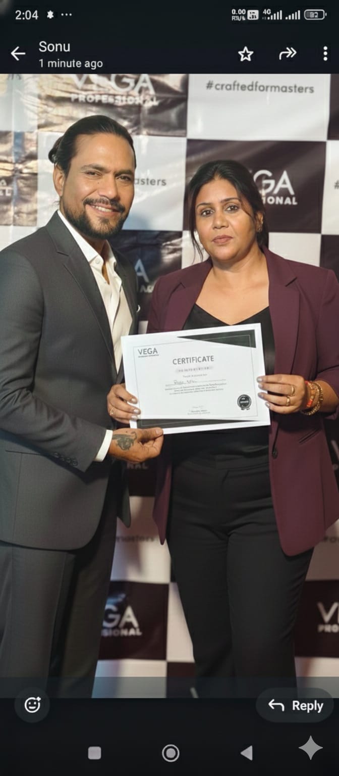 Rajni Mitra receiving VEGA Professional certification on stage